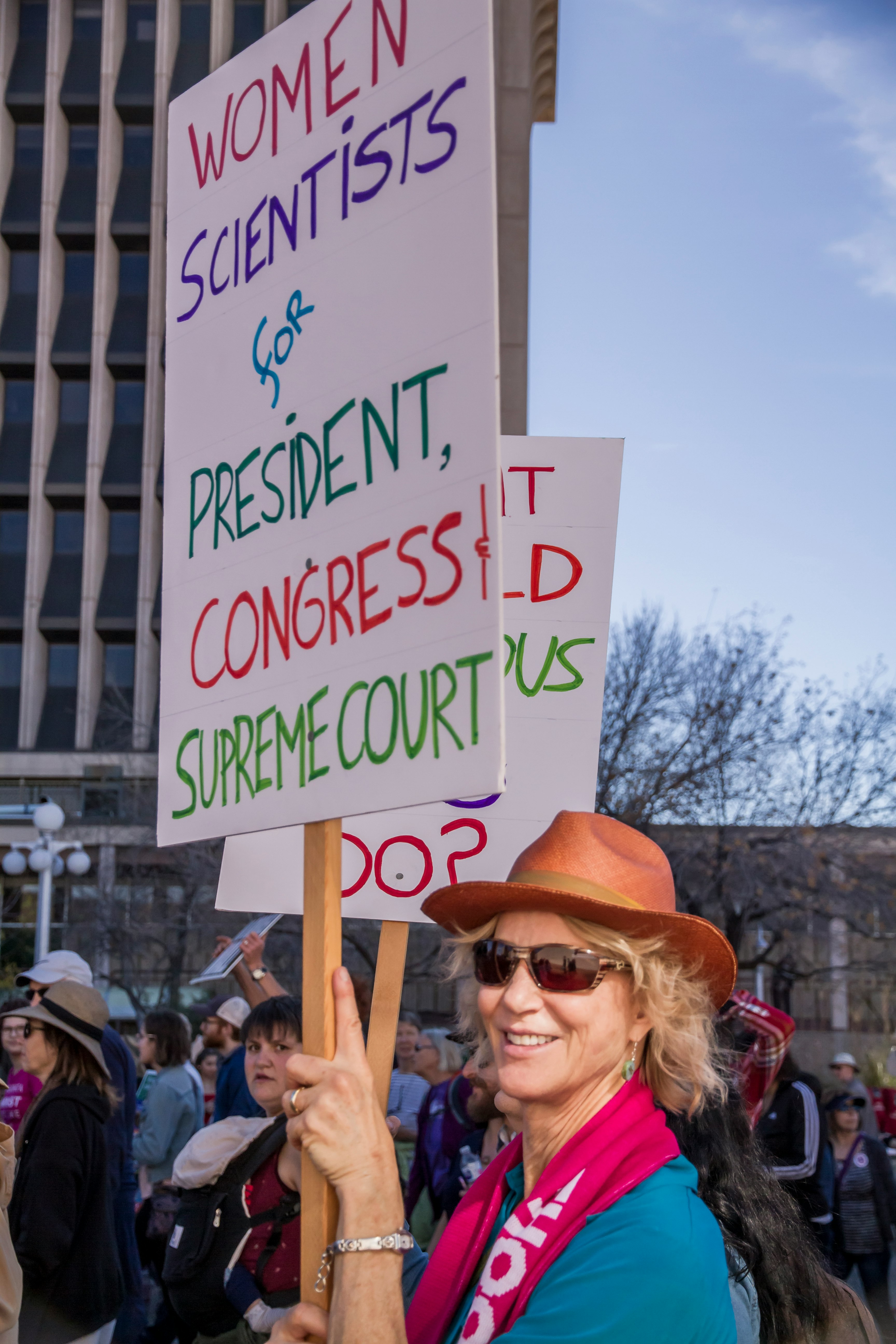 person holding poster